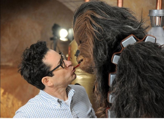 film-director-j-j-abrams-doing-the-twizzler-challenge-with-star-wars-the-force-awakens-character-chewbacca